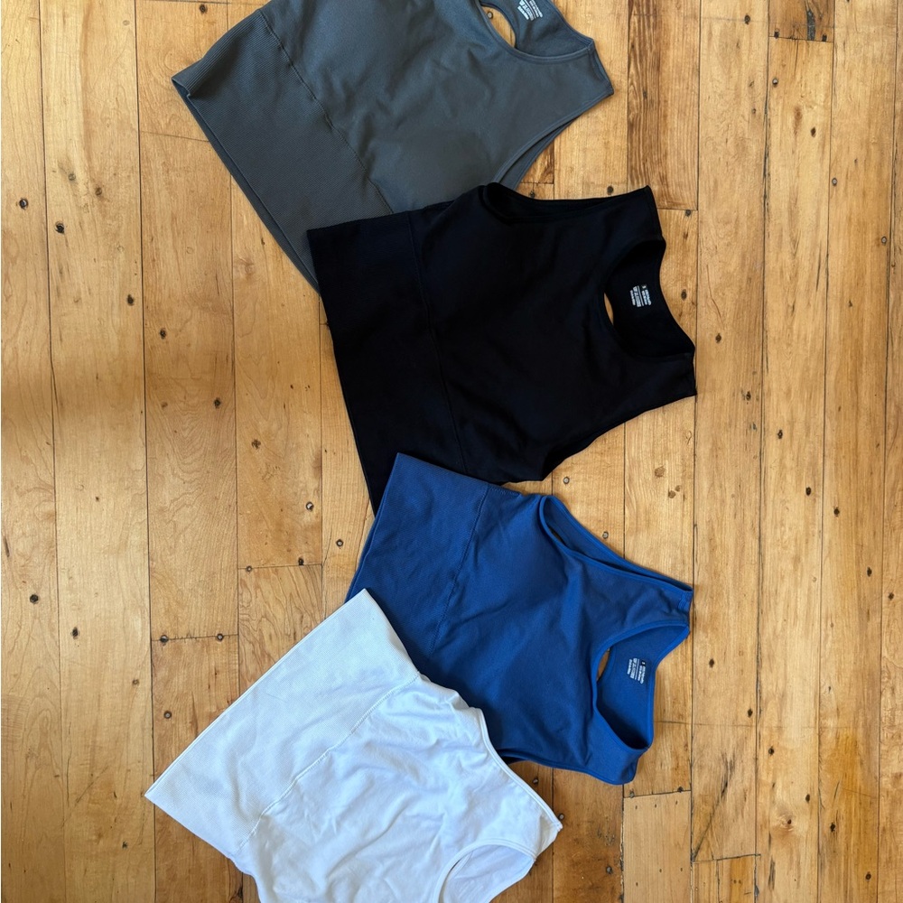 Set of Four Sleeveless Tops in Gray, Black, Blue, and White